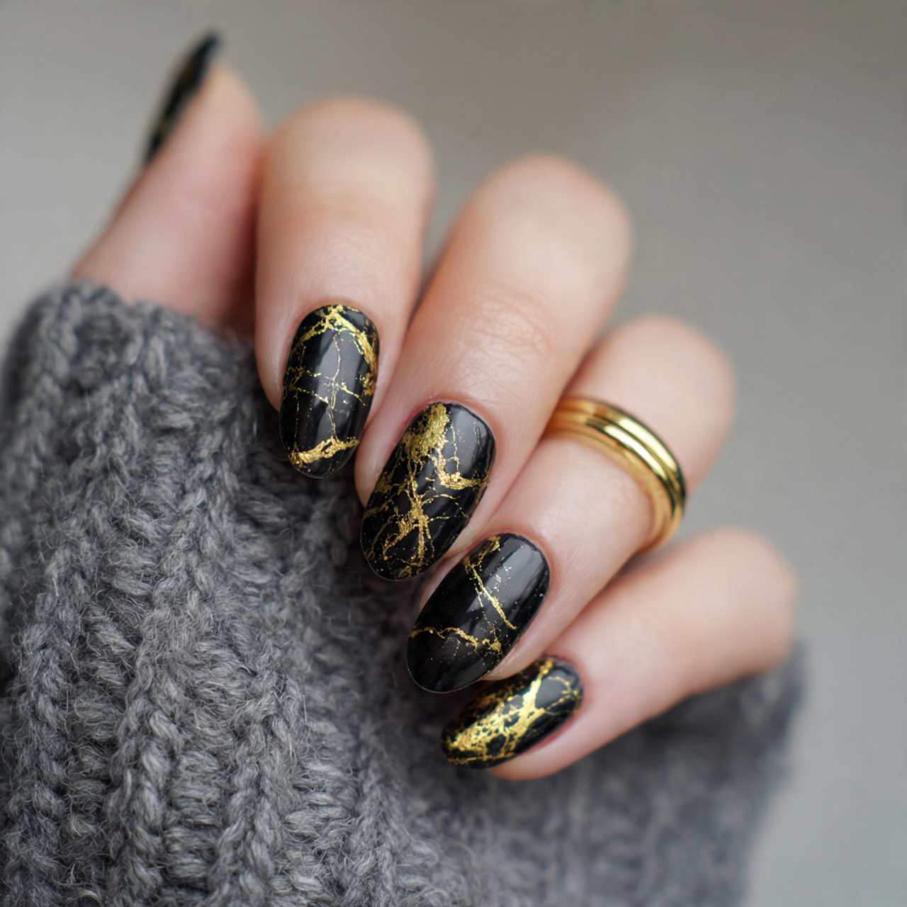 Black And Gold Marble Nails
