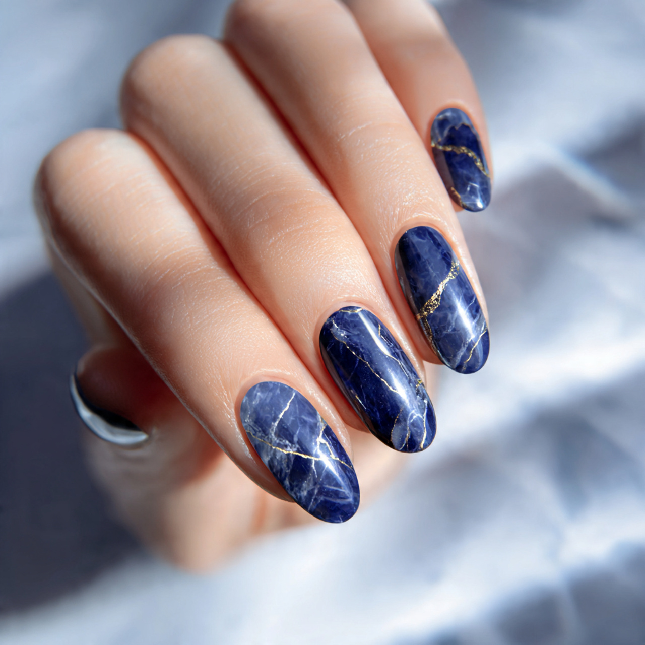 Navy Blue Nails: 18 Chic Designs You’ll Want to Try Now 10 Navy Blue Marble Nails