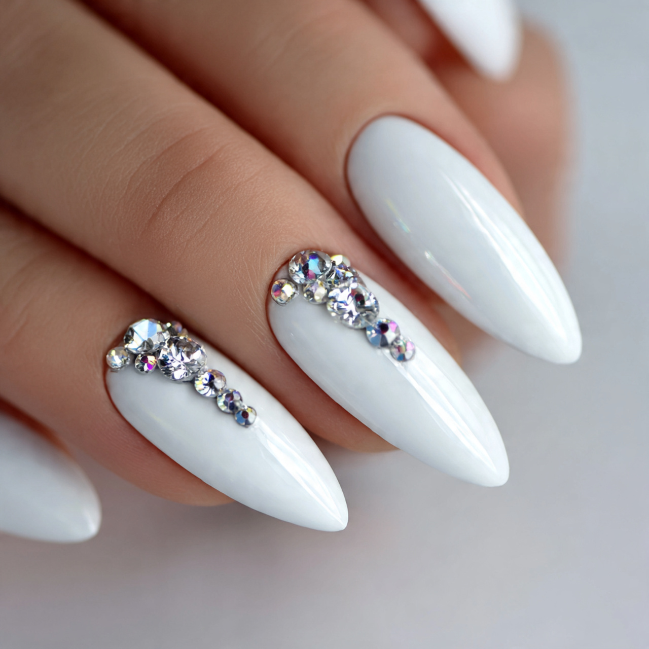 White Chrome Nails: 17 Stunning Styles to Try This Year 13 White Chrome Nails with Rhinestones